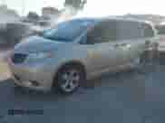 2014 Toyota Sienna L with VIN 5TDZK3DC0ES435998, listed as a IAAI auction lot 43475071 with 69,397 mi miles and . Bid and sale history available at DreamBid. Image 2.