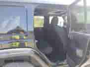 2021 Jeep Wrangler Unlimited Rubicon with VIN 1C4HJXFN5MW550311, listed as a IAAI auction lot 43233853 with 73,508 mi miles and . Bid and sale history available at DreamBid. Image 8.