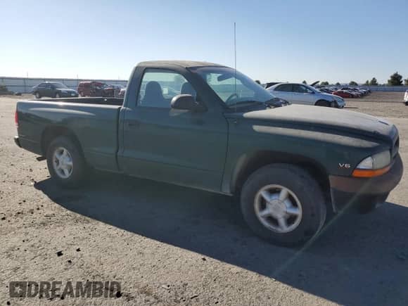 2000 Dodge Dakota с VIN 1B7FL26X1YS753294, выставлен на аукционе Copart как лот 70055785 с пробегом Не указан миль и Чистый • Clean title. История ставок и продаж доступна на DreamBid. Изображение 4.