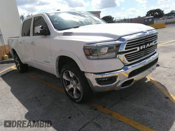 2021 Ram 1500 Laramie z VIN 1C6SRFJM5MN648372, wystawiony jako IAAI lot #41946610 z przebiegiem 10 161 mil mil oraz . Historia ofert i sprzedaży dostępna na DreamBid. Obrazek 1.