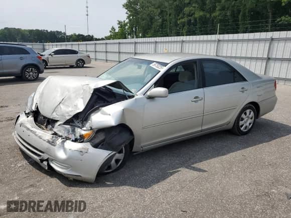 2002 Toyota Camry LE с VIN 4T1BE32K92U505665, выставлен на аукционе Copart как лот 59753255 с пробегом 237 313 миль миль и Списание • Salvage title. История ставок и продаж доступна на DreamBid. Изображение 1.