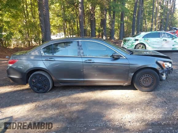 2009 Honda Accord LX z VIN JHMCP26399C017296, wystawiony jako IAAI lot #43456447 z przebiegiem 151 526 mil mil oraz . Historia ofert i sprzedaży dostępna na DreamBid. Obrazek 13.