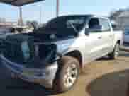 2020 Ram 1500 Big Horn z VIN 1C6RREFT9LN226953, wystawiony jako IAAI lot #41433603 z przebiegiem 130 350 mil mil oraz . Historia ofert i sprzedaży dostępna na DreamBid. Obrazek 2.