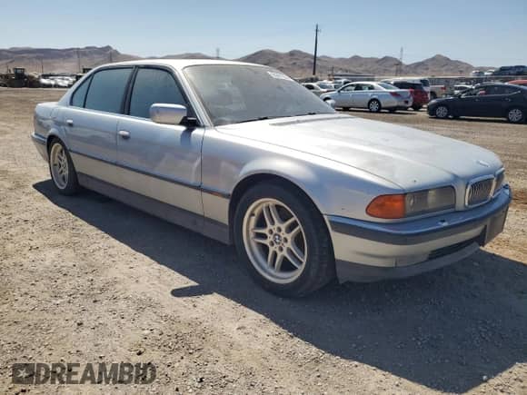 1997 BMW 7 Series with VIN WBAGK2327VDH68057, listed as a Copart auction lot 55881224 with 178,322 mi miles and Salvage title. Bid and sale history available at DreamBid. Image 4.