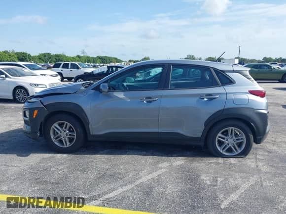 2021 Hyundai Kona SE z VIN KM8K12AA6MU705288, wystawiony jako IAAI lot #39764414 z przebiegiem 75 528 mil mil oraz . Historia ofert i sprzedaży dostępna na DreamBid. Obrazek 13.