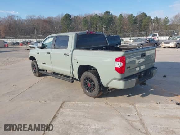 2021 Toyota Tundra SR5 with VIN 5TFDY5F14MX046533, listed as a IAAI auction lot 41663194 with 55,758 mi miles and . Bid and sale history available at DreamBid. Image 3.