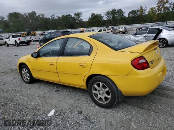 2004 Dodge Neon SXT with VIN 1B3ES56C84D538802, listed as a Copart auction lot 82187635 with 159,319 mi miles and Salvage title. Bid and sale history available at DreamBid. Image 2.