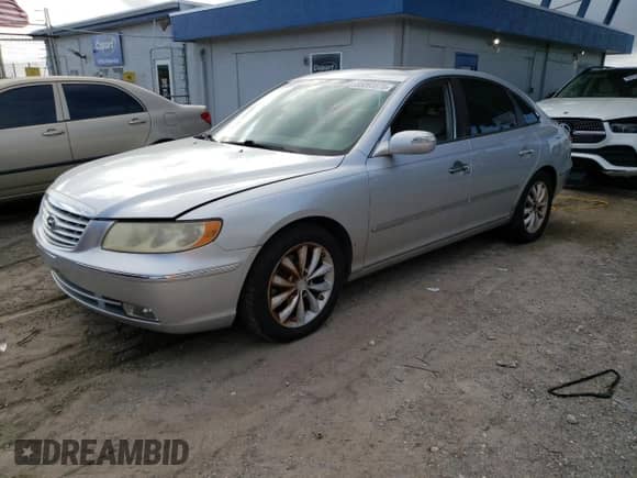 2007 Hyundai Azera SE с VIN KMHFC46F07A242937, выставлен на аукционе Copart как лот 85093875 с пробегом 118 060 миль миль и Чистый • Clean title. История ставок и продаж доступна на DreamBid. Изображение 1.