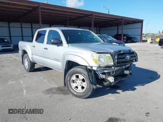 2007 Toyota Tacoma PreRunner z VIN 3TMJU62N97M031274, wystawiony jako IAAI lot #43005358 z przebiegiem 101 420 mil mil oraz . Historia ofert i sprzedaży dostępna na DreamBid. Obrazek 1.