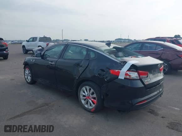 2016 Kia Optima EX with VIN 5XXGU4L36GG070739, listed as a IAAI auction lot 42765882 with 64,815 mi miles and . Bid and sale history available at DreamBid. Image 3.