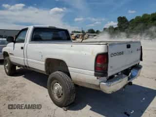 2001 Dodge 2500 with VIN 3B7KF26Z41M561258, listed as a Copart auction lot 60939814 with 220,477 mi miles and Clean title. Bid and sale history available at DreamBid. Image 2.
