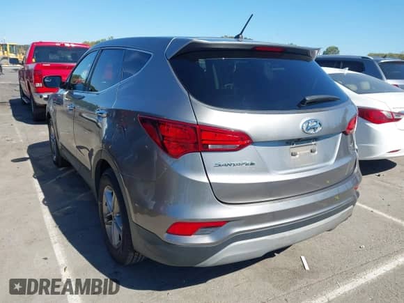 2018 Hyundai Santa Fe 2.4L with VIN 5NMZT3LB1JH090662, listed as a IAAI auction lot 43490470 with 133,046 mi miles and . Bid and sale history available at DreamBid. Image 3.