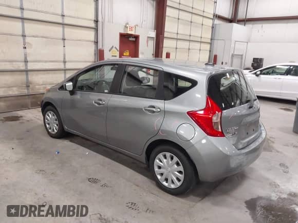 2015 Nissan Note S Plus z VIN 3N1CE2CP1FL366891, wystawiony jako IAAI lot #43053008 z przebiegiem 56 330 mil mil oraz . Historia ofert i sprzedaży dostępna na DreamBid. Obrazek 3.