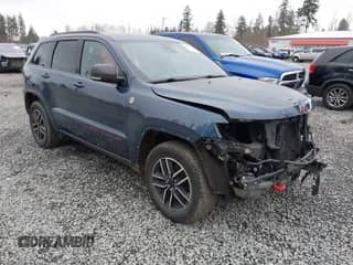 2020 Jeep Grand Cherokee Trailhawk with VIN 1C4RJFLG0LC360145, listed as a IAAI auction lot 41816095 with 50,717 mi miles and . Bid and sale history available at DreamBid. Image 1.