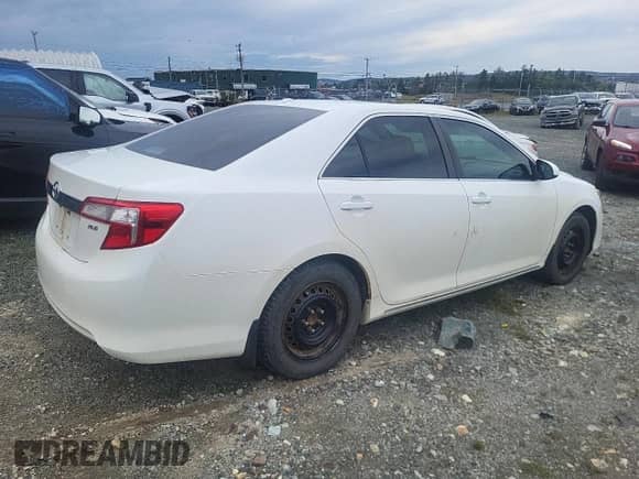 2012 Toyota Camry XLE with VIN 4T1BK1FK7CU514664, listed as a Copart auction lot 71484725 with 335,770 mi miles and Clean title. Bid and sale history available at DreamBid. Image 3.