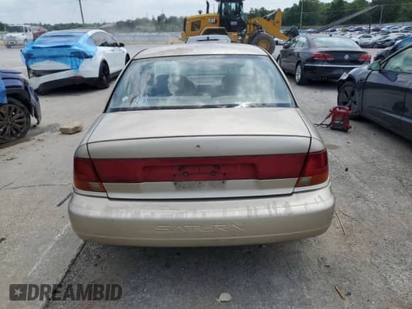 1998 Saturn SL with VIN 1G8ZK5277WZ220288, listed as a Copart auction lot 65541225 with 95,805 mi miles and Non repairable. Bid and sale history available at DreamBid. Image 6.