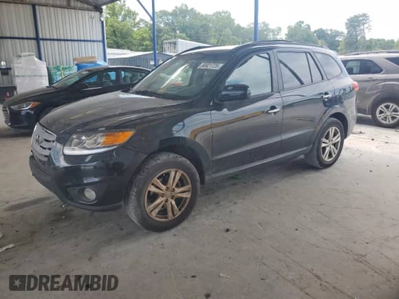 2012 Hyundai Santa Fe Limited z VIN 5XYZK4AG4CG121584, wystawiony jako Copart lot #66921725 z przebiegiem 69 057 mil mil oraz Szkoda całkowita • Salvage title. Historia ofert i sprzedaży dostępna na DreamBid. Obrazek 1.