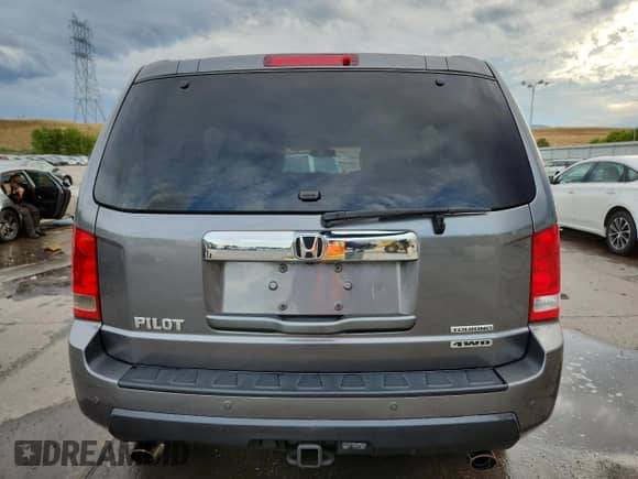 2009 Honda Pilot Touring with VIN 5FNYF38809B027002, listed as a Copart auction lot 80465055 with 90,269 mi miles and Salvage title. Bid and sale history available at DreamBid. Image 6.