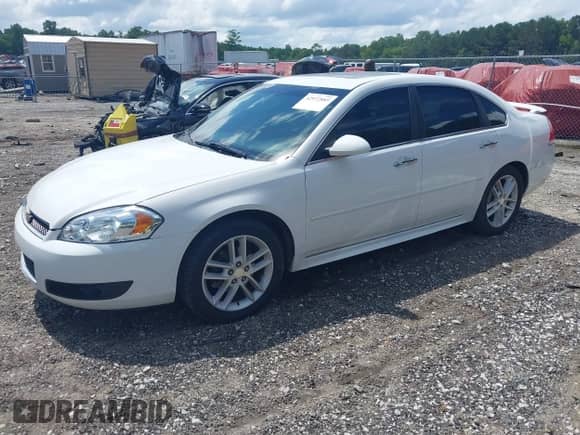 2014 Chevrolet Impala LTZ with VIN 2G1WC5E30E1181722, listed as a IAAI auction lot 42972885 with 122,847 mi miles and . Bid and sale history available at DreamBid. Image 2.