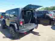 2015 Jeep Wrangler Rubicon Hard Rock z VIN 1C4BJWCG1FL610028, wystawiony jako IAAI lot #42318569 z przebiegiem 48 627 mil mil oraz . Historia ofert i sprzedaży dostępna na DreamBid. Obrazek 3.