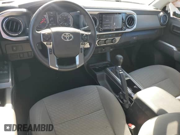 2022 Toyota Tacoma SR z VIN 3TYSZ5AN6NT095677, wystawiony jako Copart lot #84992975 z przebiegiem 25 953 mil mil oraz Szkoda całkowita • Salvage title. Historia ofert i sprzedaży dostępna na DreamBid. Obrazek 8.