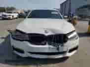 2020 BMW 5 Series M550i xDrive with VIN WBAJS7C02LBN96544, listed as a Copart auction lot 64272345 with 42,734 mi miles and Salvage title. Bid and sale history available at DreamBid. Image 5.