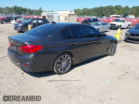 2017 BMW 5 Series 530i xDrive with VIN WBAJA7C35HG457970, listed as a IAAI auction lot 43197875 with 84,885 mi miles and . Bid and sale history available at DreamBid. Image 4.