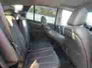 2012 Hyundai Santa Fe Limited z VIN 5XYZKDAG1CG117282, wystawiony jako Copart lot #81104275 z przebiegiem 110 843 mil mil oraz Szkoda całkowita • Salvage title. Historia ofert i sprzedaży dostępna na DreamBid. Obrazek 11.