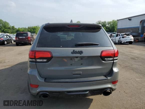 2020 Jeep Grand Cherokee SRT with VIN 1C4RJFDJ8LC158048, listed as a Copart auction lot 57426205 with 52,979 mi miles and Salvage title. Bid and sale history available at DreamBid. Image 6.