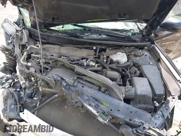 2022 Toyota Camry Hybrid LE with VIN 4T1C31AK2NU575304, listed as a IAAI auction lot 43017963 with 165,647 mi miles and . Bid and sale history available at DreamBid. Image 10.