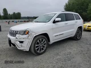 2017 Jeep Grand Cherokee Overland with VIN 1C4RJECG6HC965661, listed as a Copart auction lot 65547715 with 76,441 mi miles and Salvage title. Bid and sale history available at DreamBid. Image 1.