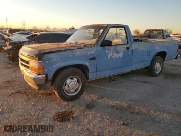 1993 Dodge Dakota S с VIN 1B7FL26X7PS268513, выставлен на аукционе Copart как лот 87258164 с пробегом 166 580 миль миль и Списание • Salvage title. История ставок и продаж доступна на DreamBid. Изображение 1.