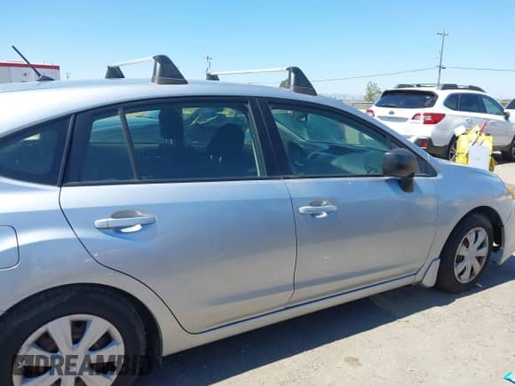 2013 Subaru Impreza 2.0i with VIN JF1GPAA69D2867755, listed as a IAAI auction lot 43094211 with 120,728 mi miles and . Bid and sale history available at DreamBid. Image 12.