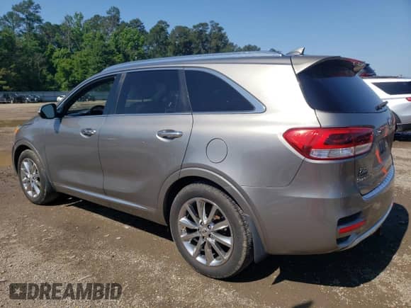 2017 Kia Sorento SXL z VIN 5XYPK4A54HG201173, wystawiony jako Copart lot #54933845 z przebiegiem 86 717 mil mil oraz Szkoda całkowita • Salvage title. Historia ofert i sprzedaży dostępna na DreamBid. Obrazek 2.