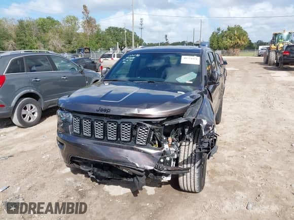 2021 Jeep Grand Cherokee Laredo E with VIN 1C4RJEAG3MC681031, listed as a IAAI auction lot 40734451 with 47,147 mi miles and . Bid and sale history available at DreamBid. Image 6.