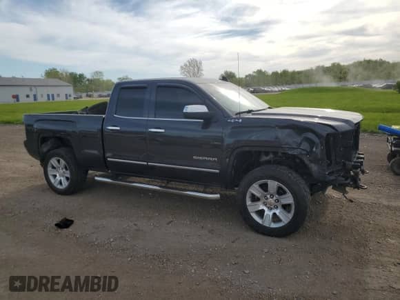 2016 GMC Sierra 1500 SLT with VIN 1GTV2NECXGZ249508, listed as a Copart auction lot 56311695 with 118,289 mi miles and Salvage title. Bid and sale history available at DreamBid. Image 4.