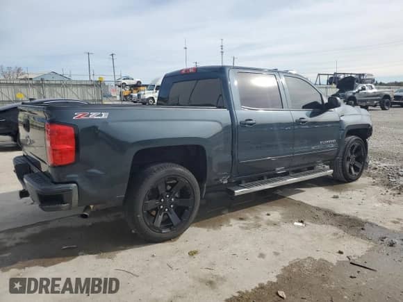 2017 Chevrolet Silverado 1500 LT with VIN 3GCUKRECXHG222975, listed as a Copart auction lot 79806504 with Not provided miles and Salvage title. Bid and sale history available at DreamBid. Image 3.
