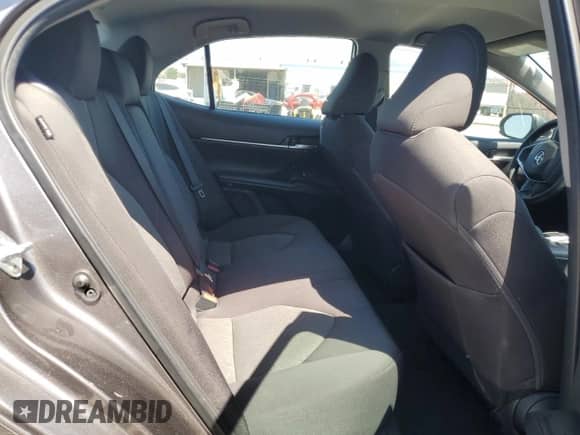 2023 Toyota Camry LE z VIN 4T1C11AK8PU829929, wystawiony jako Copart lot #71752915 z przebiegiem 49 591 mil mil oraz Szkoda całkowita • Salvage title. Historia ofert i sprzedaży dostępna na DreamBid. Obrazek 10.