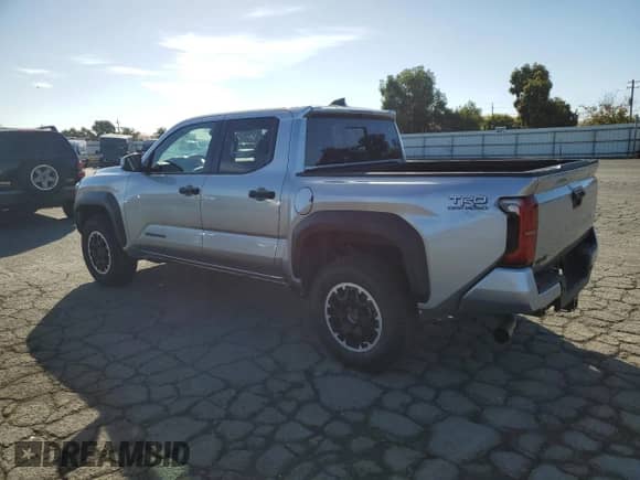 2024 Toyota Tacoma TRD Off Road with VIN 3TMLB5JN8RM000837, listed as a Copart auction lot 82183745 with 14,184 mi miles and Salvage title. Bid and sale history available at DreamBid. Image 2.