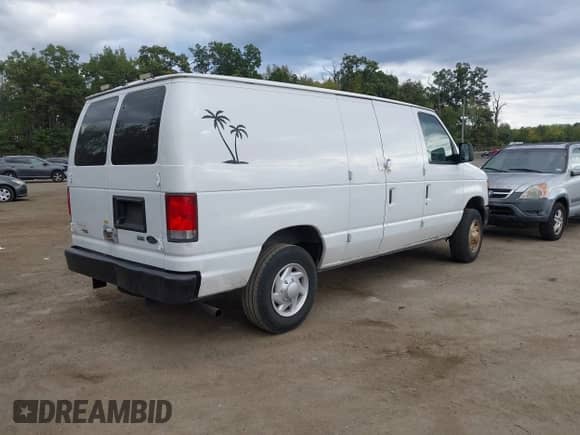 2014 Ford Econoline Cargo Commercial with VIN 1FTNE1EWXEDA07967, listed as a IAAI auction lot 43409244 with 143,735 mi miles and . Bid and sale history available at DreamBid. Image 4.