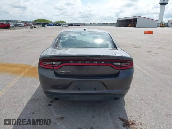 2020 Dodge Charger Police z VIN 2C3CDXKT4LH120180, wystawiony jako IAAI lot #42834441 z przebiegiem 128 459 mil mil oraz . Historia ofert i sprzedaży dostępna na DreamBid. Obrazek 16.