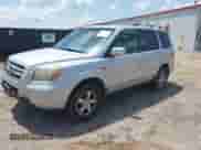 2006 Honda Pilot EX-L z VIN 5FNYF28576B011097, wystawiony jako IAAI lot #42669917 z przebiegiem 327 851 mil mil oraz . Historia ofert i sprzedaży dostępna na DreamBid. Obrazek 2.