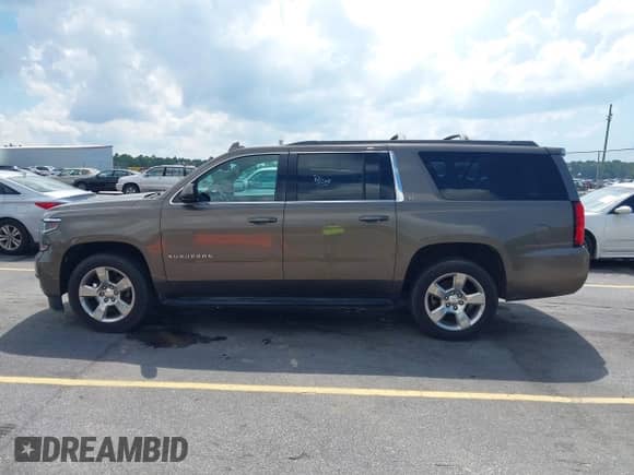 2016 Chevrolet Suburban LT z VIN 1GNSCHKCXGR346074, wystawiony jako IAAI lot #42721809 z przebiegiem 130 514 mil mil oraz . Historia ofert i sprzedaży dostępna na DreamBid. Obrazek 15.