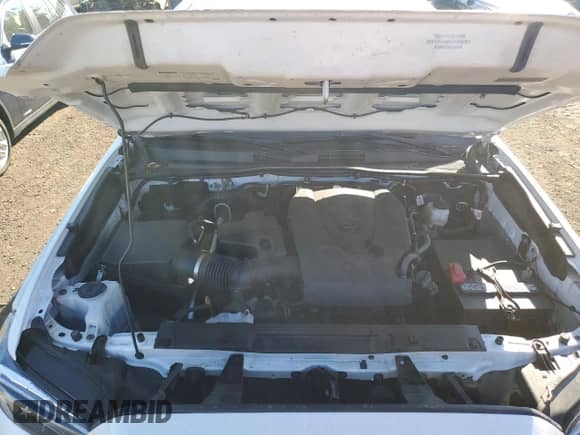 2022 Toyota Tacoma SR z VIN 3TYSZ5AN0NT080091, wystawiony jako Copart lot #70502085 z przebiegiem 72 221 mil mil oraz Szkoda całkowita • Salvage title. Historia ofert i sprzedaży dostępna na DreamBid. Obrazek 11.