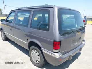1992 Dodge Caravan with VIN 2B4GH2534NR515860, listed as a IAAI auction lot 42509192 with 144,543 mi miles and . Bid and sale history available at DreamBid. Image 3.