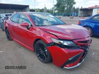 2021 Toyota Camry XSE with VIN 4T1K61BK2MU033801, listed as a IAAI auction lot 43219022 with 43,289 mi miles and . Bid and sale history available at DreamBid. Image 1.