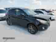 2014 Hyundai Tucson Limited with VIN KM8JU3AG8EU939334, listed as a Copart auction lot 69634955 with 128,580 mi miles and Salvage title. Bid and sale history available at DreamBid. Image 4.