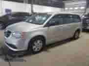 2012 Dodge Grand Caravan American Value z VIN 2C4RDGBGXCR105234, wystawiony jako Copart lot #69327725 z przebiegiem 141 911 mil mil oraz Szkoda całkowita • Salvage title. Historia ofert i sprzedaży dostępna na DreamBid. Obrazek 1.