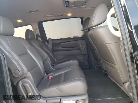 2013 Honda Odyssey EX-L z VIN 5FNRL5H66DB023651, wystawiony jako Copart lot #48676274 z przebiegiem 164 687 mil mil oraz Szkoda całkowita • Salvage title. Historia ofert i sprzedaży dostępna na DreamBid. Obrazek 12.