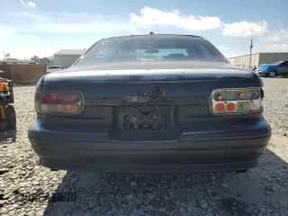 1994 Chevrolet Caprice LS с VIN 1G1BN52P8RR189208, выставлен на аукционе Copart как лот 46967845 с пробегом Не указан миль и Списание • Salvage title. История ставок и продаж доступна на DreamBid. Изображение 6.